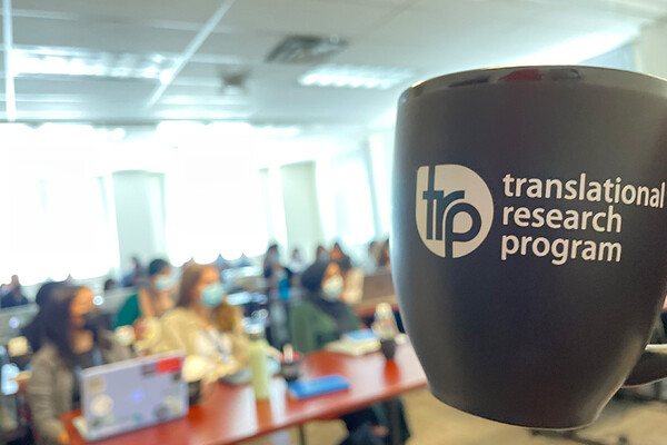 A mug with Translational Research Program written on it