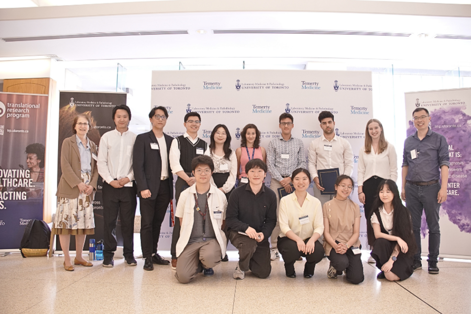 A group of people posing for the camera